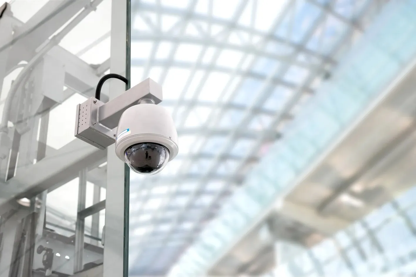 Dome security camera in commercial building